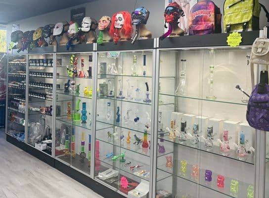 Vape devices and accessory shelf at Inhale Exhale Smoke